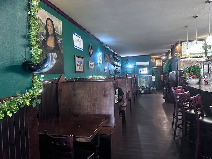 Bar and booth seating inside Poor Parson's Pub